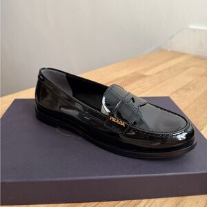 Prada - Patent Lather Black Loafers with Gold Logo